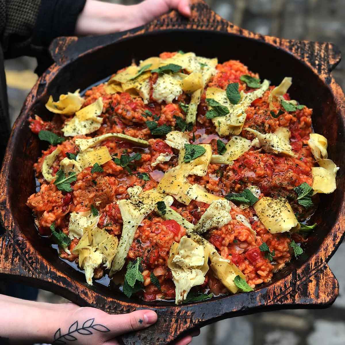 Sicilian rice with artichokes winter tomatoes